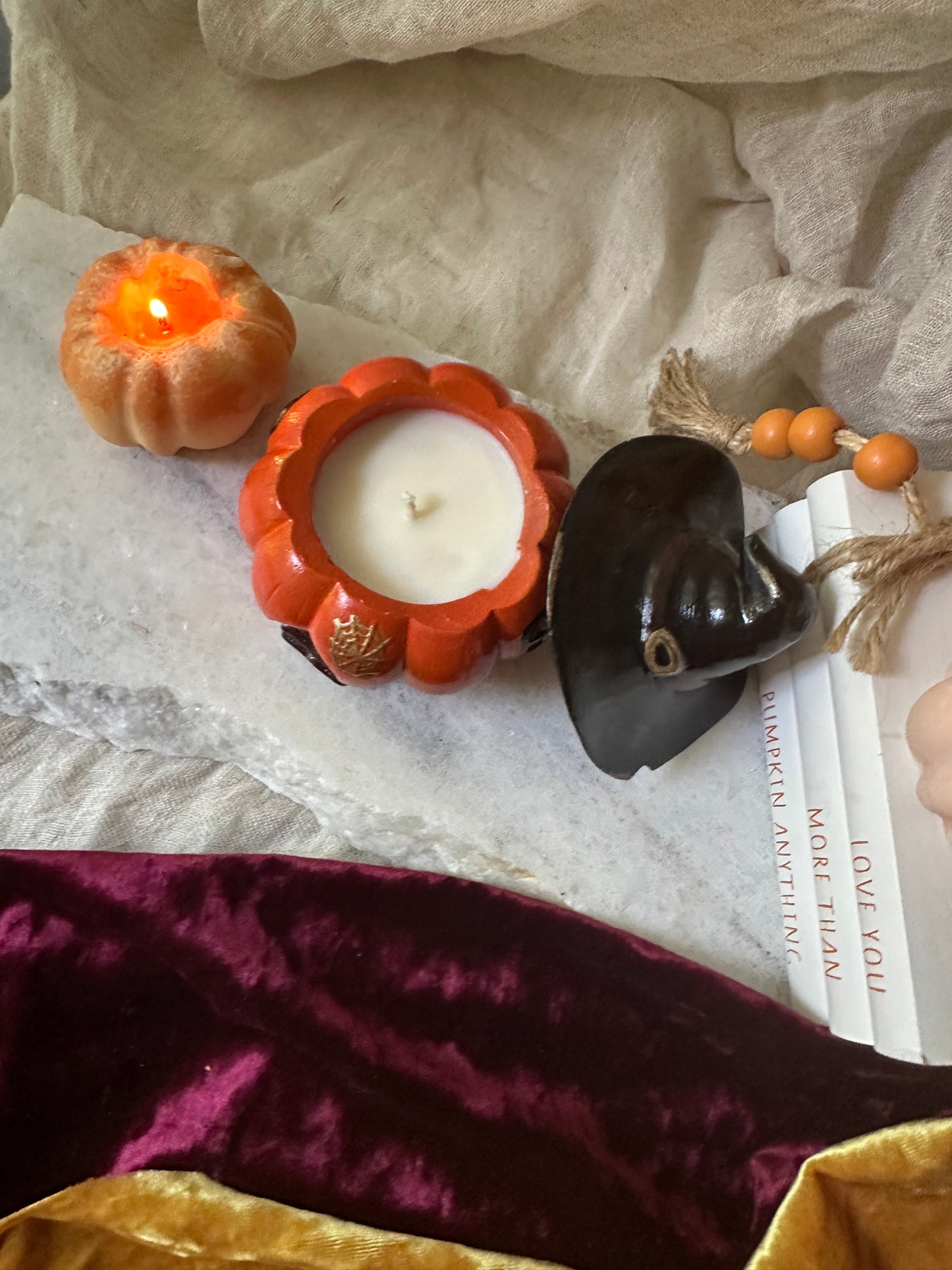 Pumpkin candle with witch hat