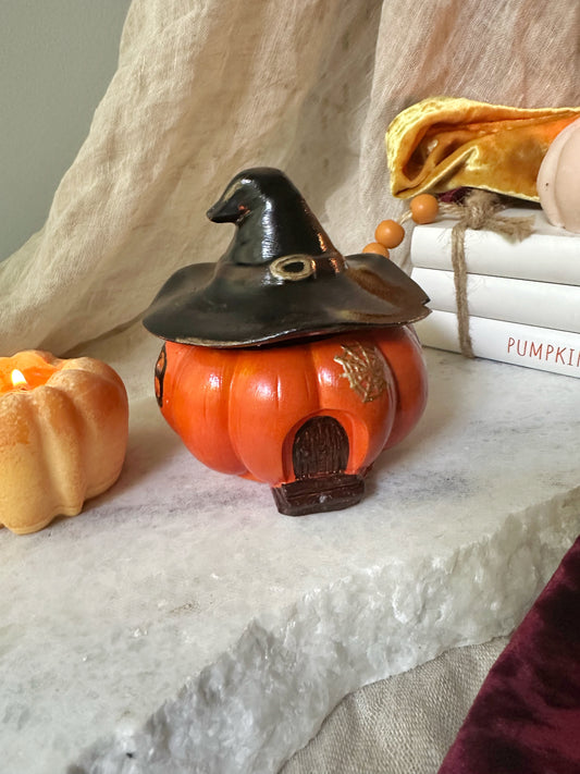 Pumpkin candle with witch hat